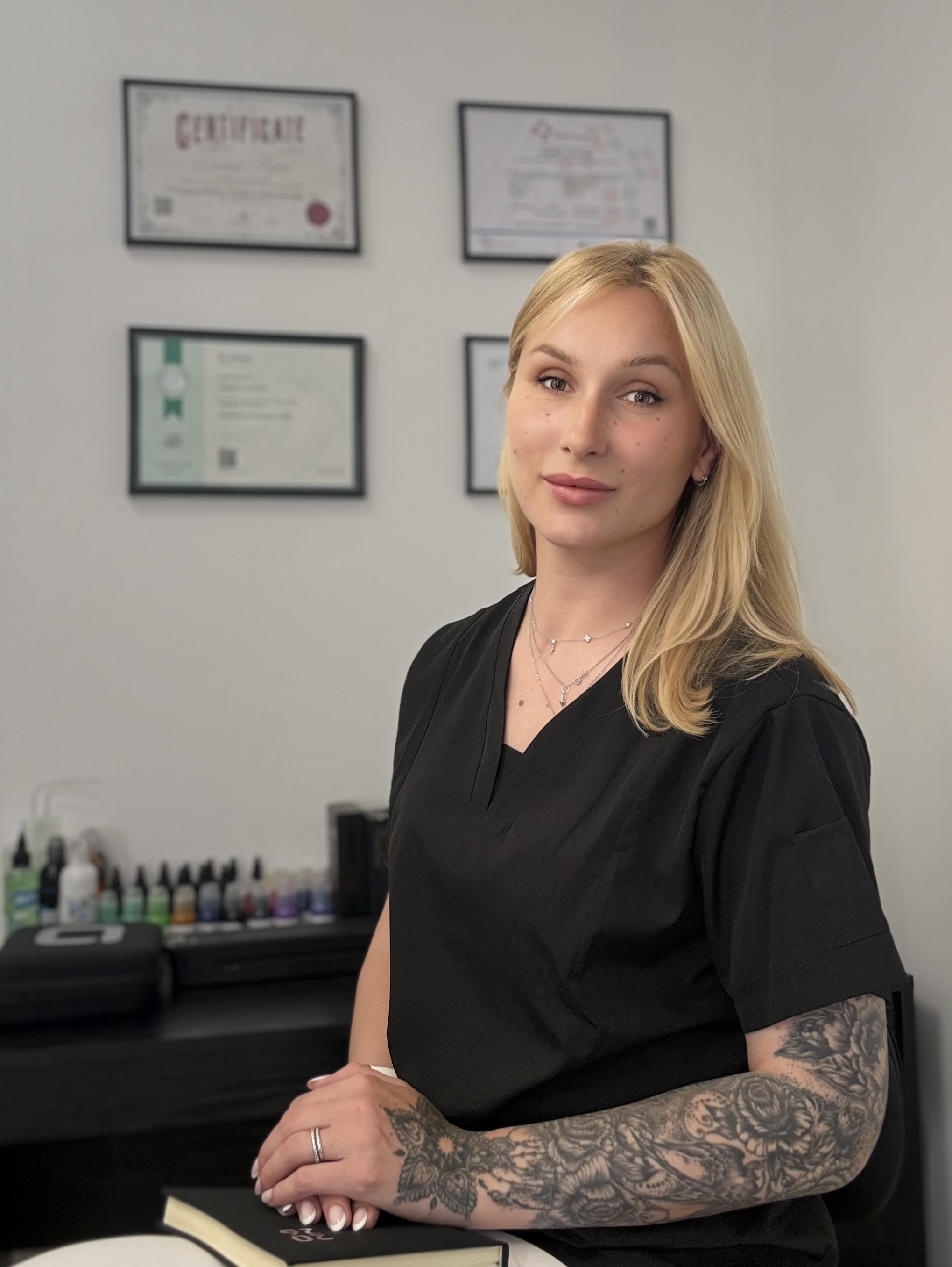 Milly, tattoo artist at her private studio in Birr