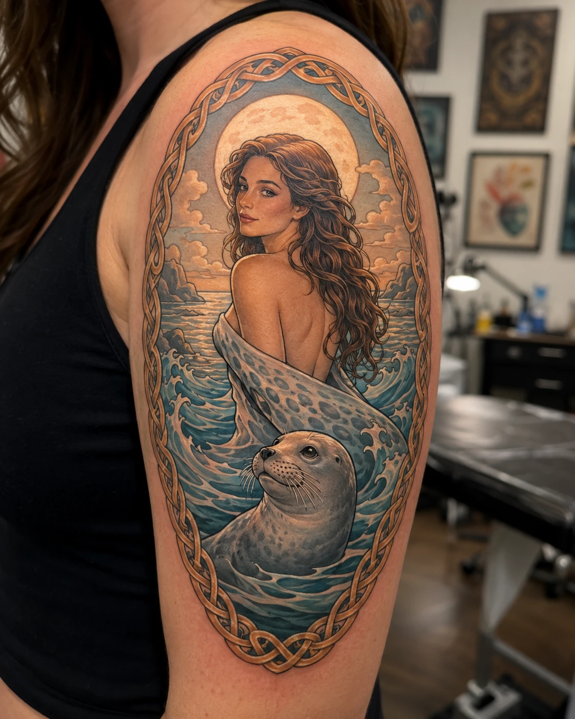 Sea woman and watchful seal meet.